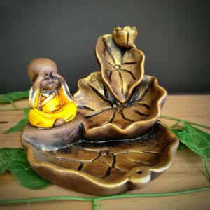 PORTA INCENSO CASCATA FOLHAS COM BUDA AMARELO 12CM