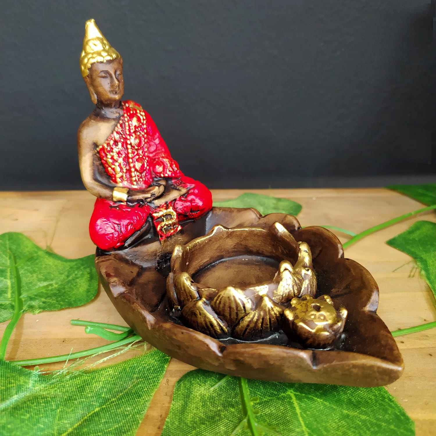 PORTA INCENSO E VELA BUDA NA FOLHA  VERMELHO 10CM