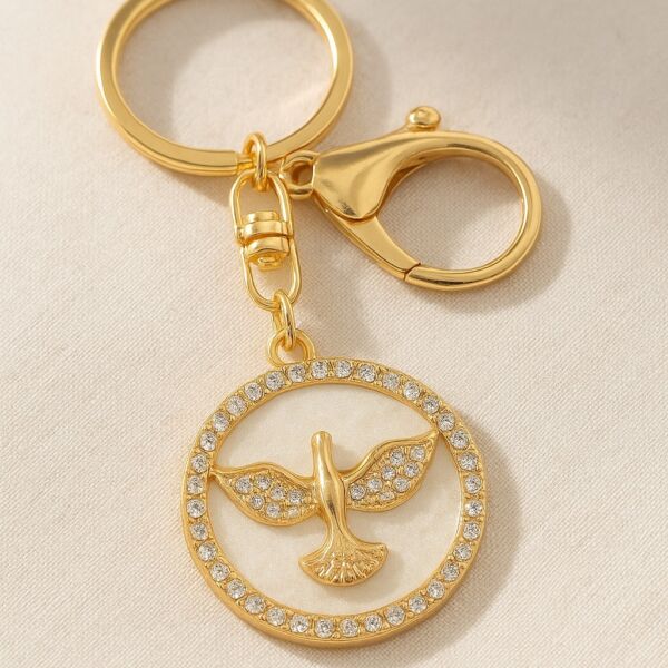 CHAVEIRO LUXO DOURADO DIVINO ESPÍRITO SANTO COM STRASS